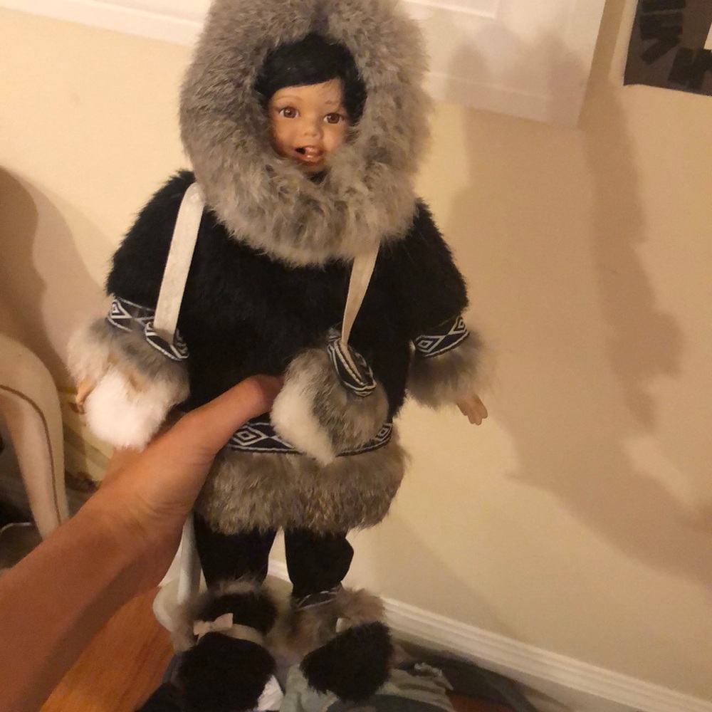 Porcelain and fur Alaskan doll